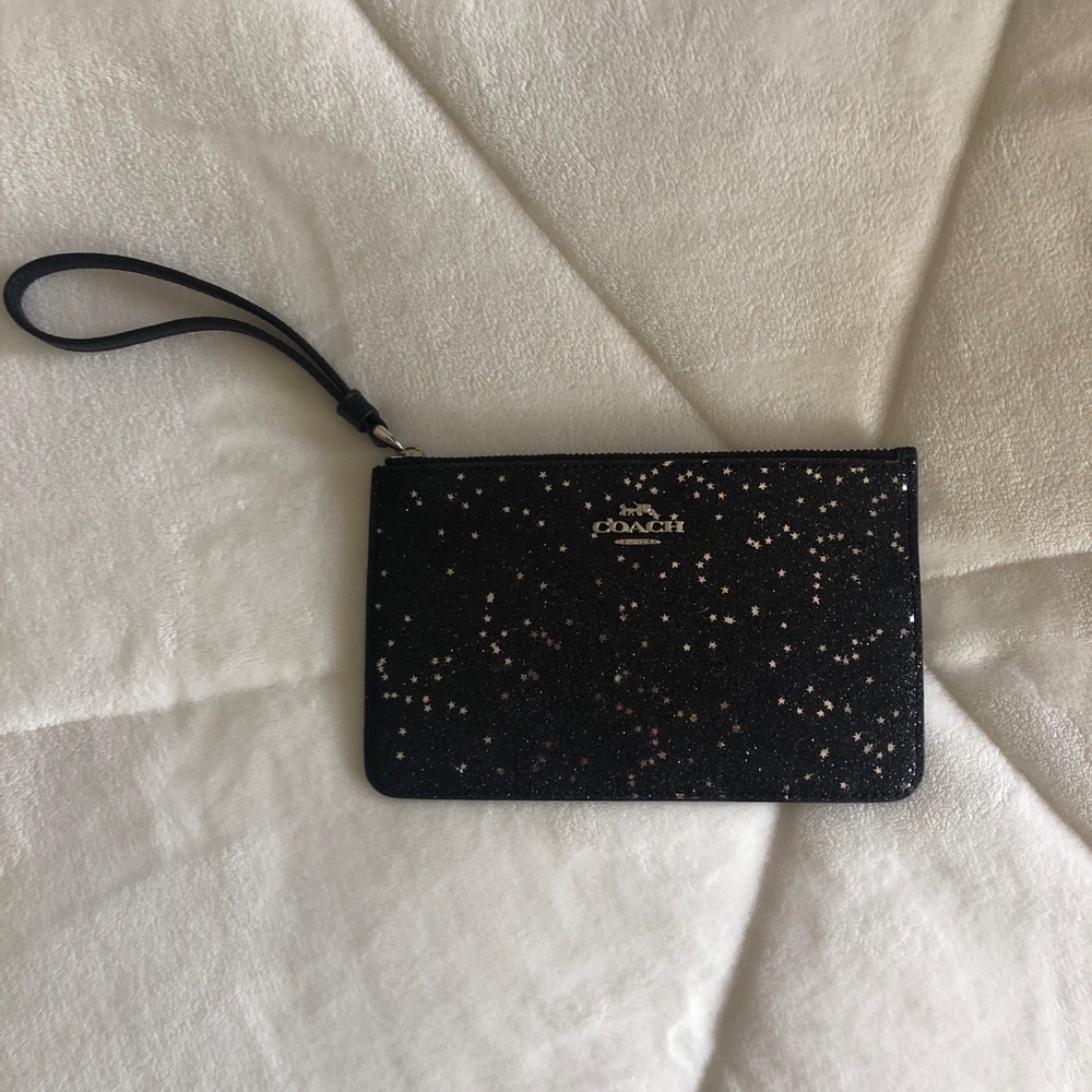 Coach sparkling wristlet.